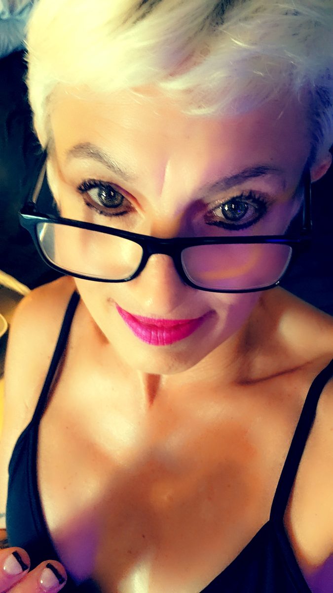 Madame D in glasses