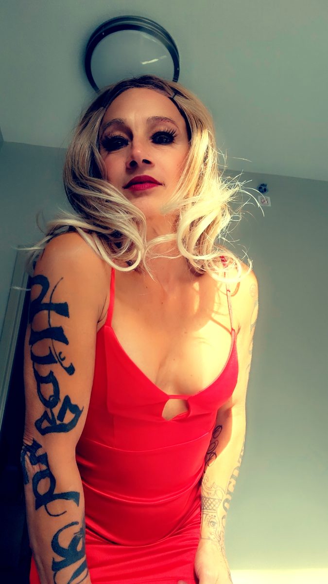 Madame D in red