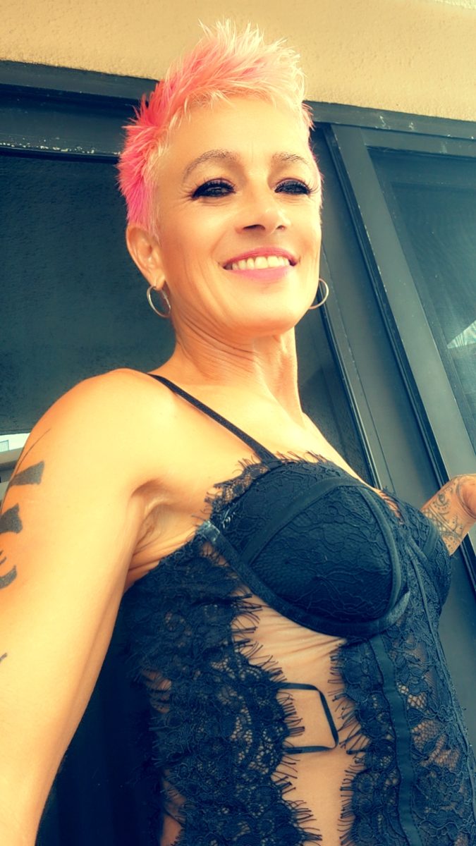 Madame D smiling